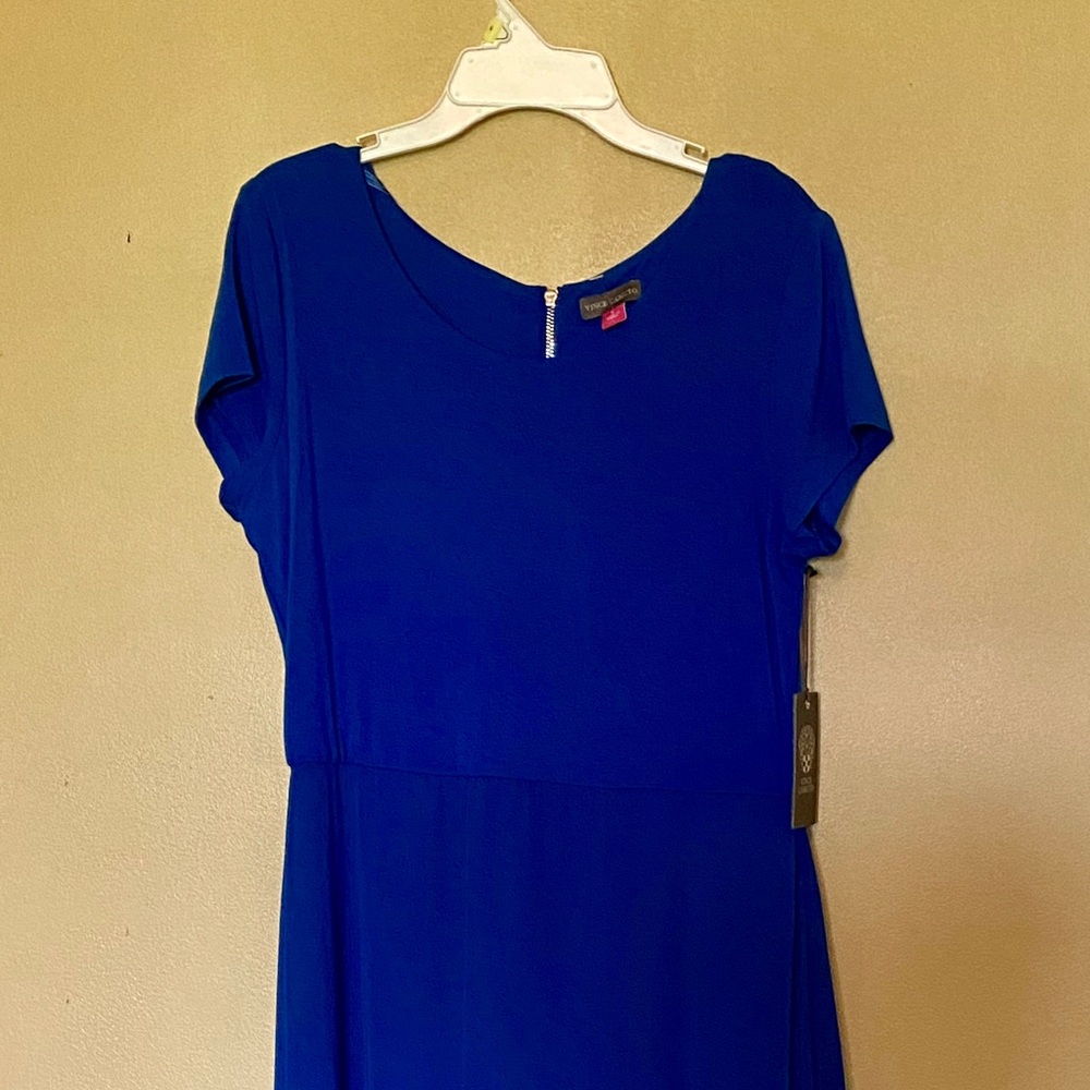 Maxi dress with slits on both sides below knee.